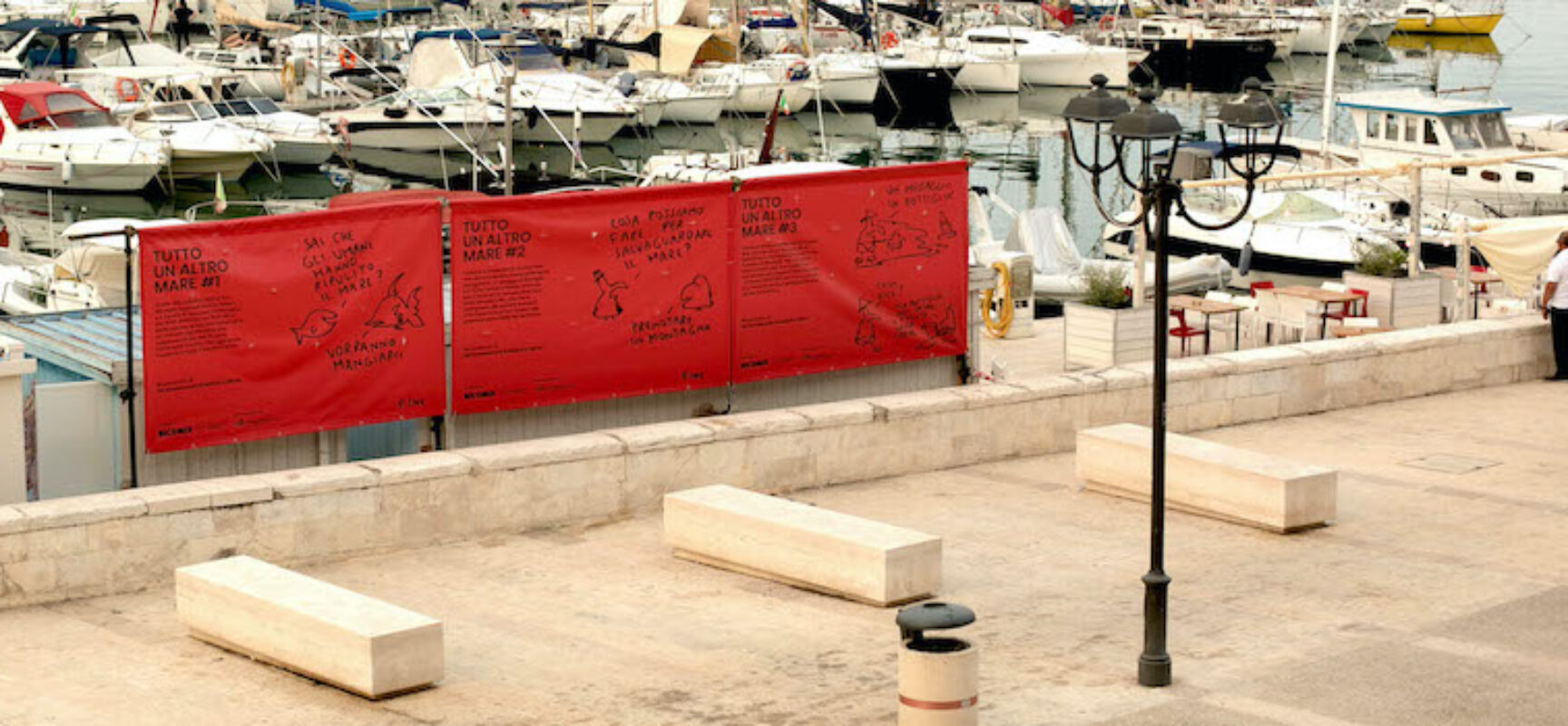 Gli Scarabocchi di Maicol & Mirco sul porto di Bisceglie per sensibilizzare sulla tutela del mare